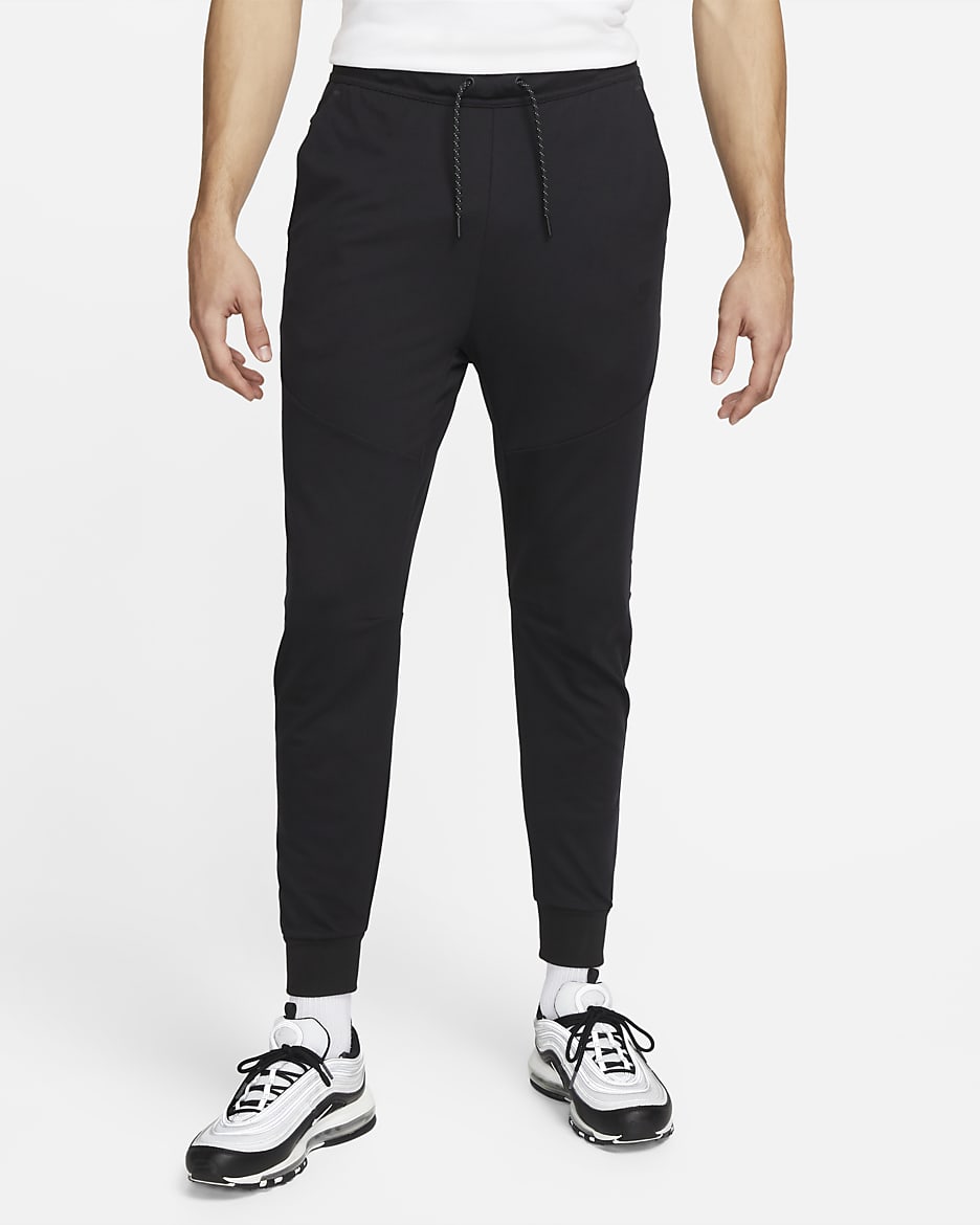 Nike Sportswear Tech Fleece Lightweight Men s Slim Fit Jogger Sweatpants. Nike